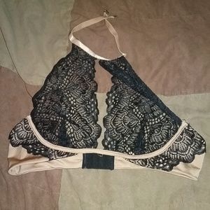 Tan and black lace bra
